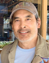 Headshot of actor Chris Tashima.